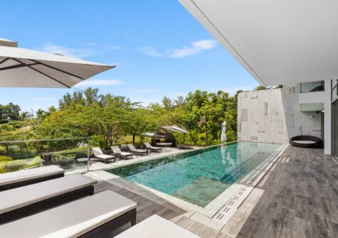 Elegant Four-Bedroom Duplex Residence with Pool Terrace & Sea Views